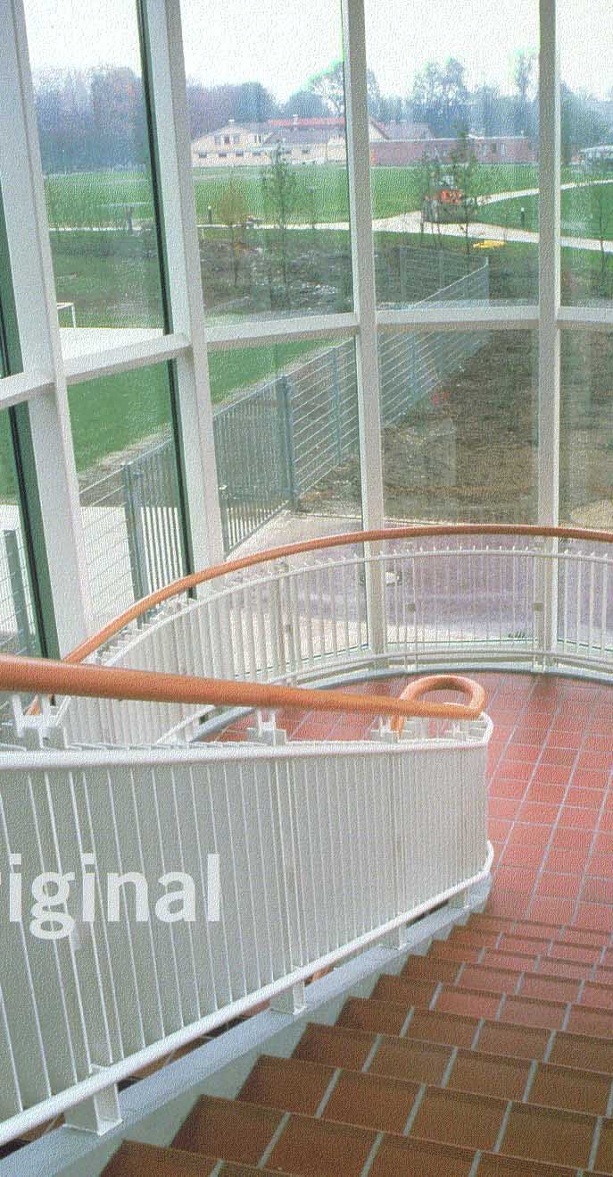  radiador que hace de barandilla de una escalera redonda